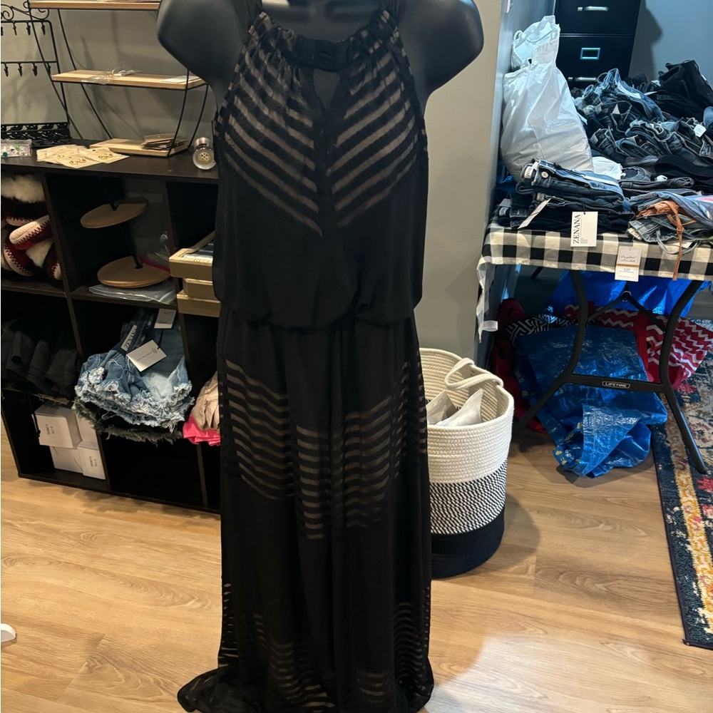 Sz 4 London Times black maxi with tan underlay. Halter neck and peep hole detail